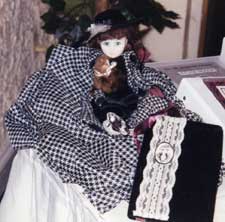 Nellie Bly doll with book